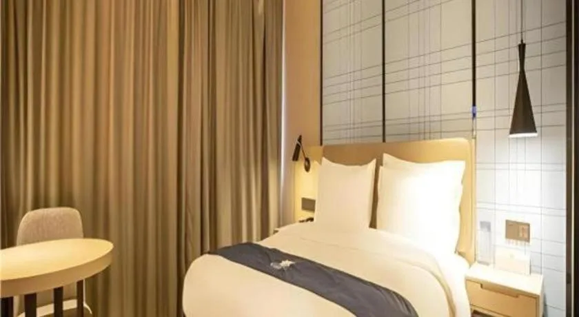 Bed in Echarm Hotel Xian Ming City Wall South Gate