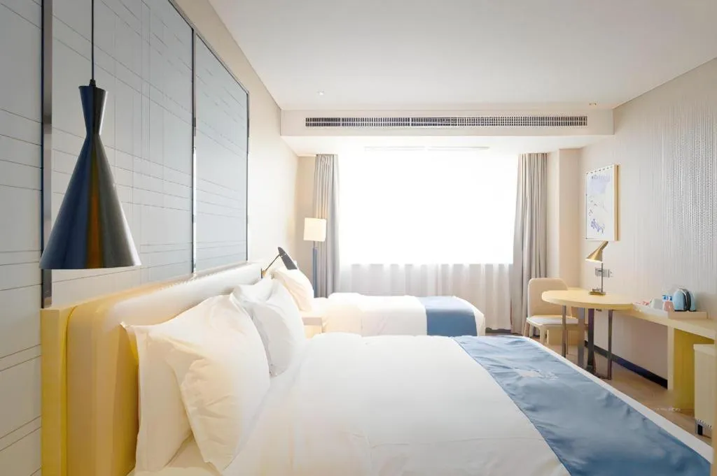 Bed in Echarm Hotel Xian Ming City Wall South Gate