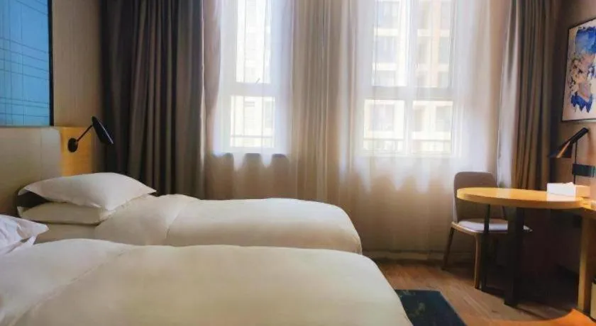 Bed in Echarm Hotel Xian Ming City Wall South Gate