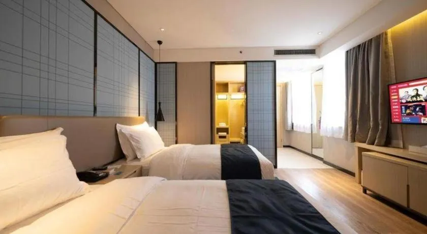 Bed in Echarm Hotel Xian Ming City Wall South Gate