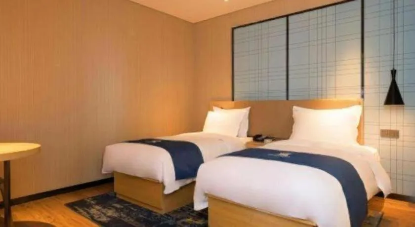 Bed in Echarm Hotel Xian Ming City Wall South Gate