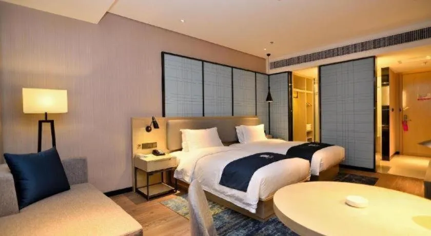 Bed in Echarm Hotel Xian Ming City Wall South Gate