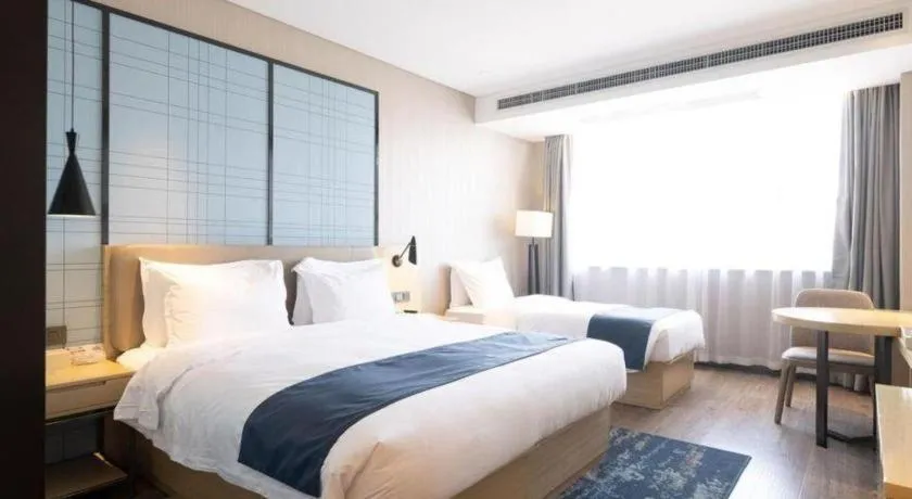 Bed in Echarm Hotel Xian Ming City Wall South Gate