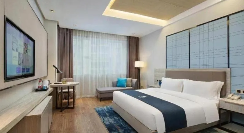 Bed in Echarm Hotel Changsha Gaoqiao