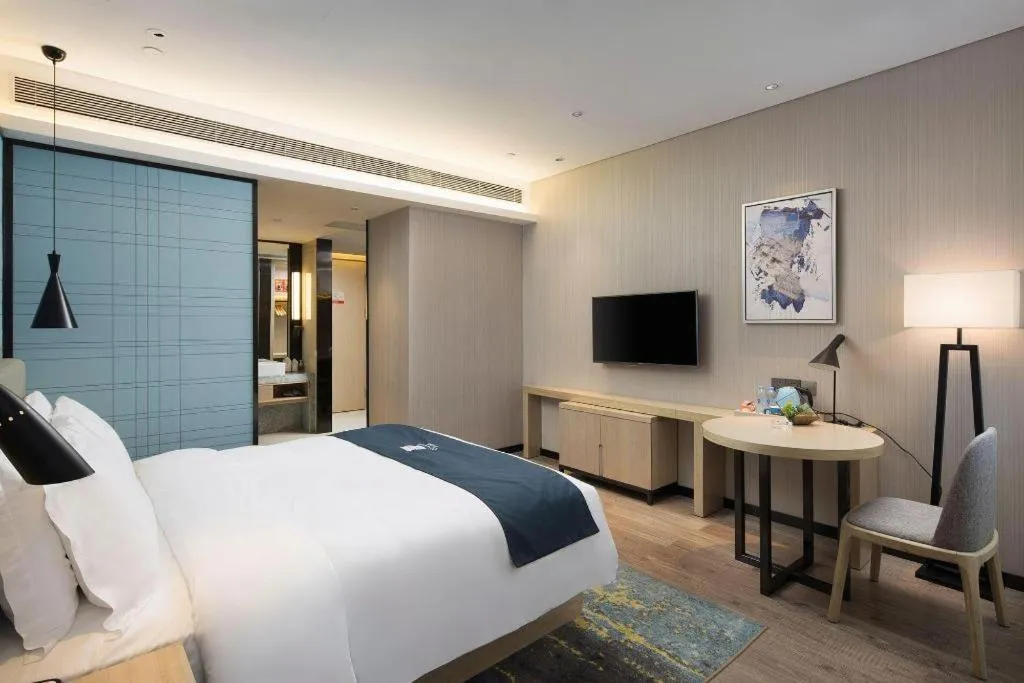 Bed in Echarm Hotel Changsha Gaoqiao