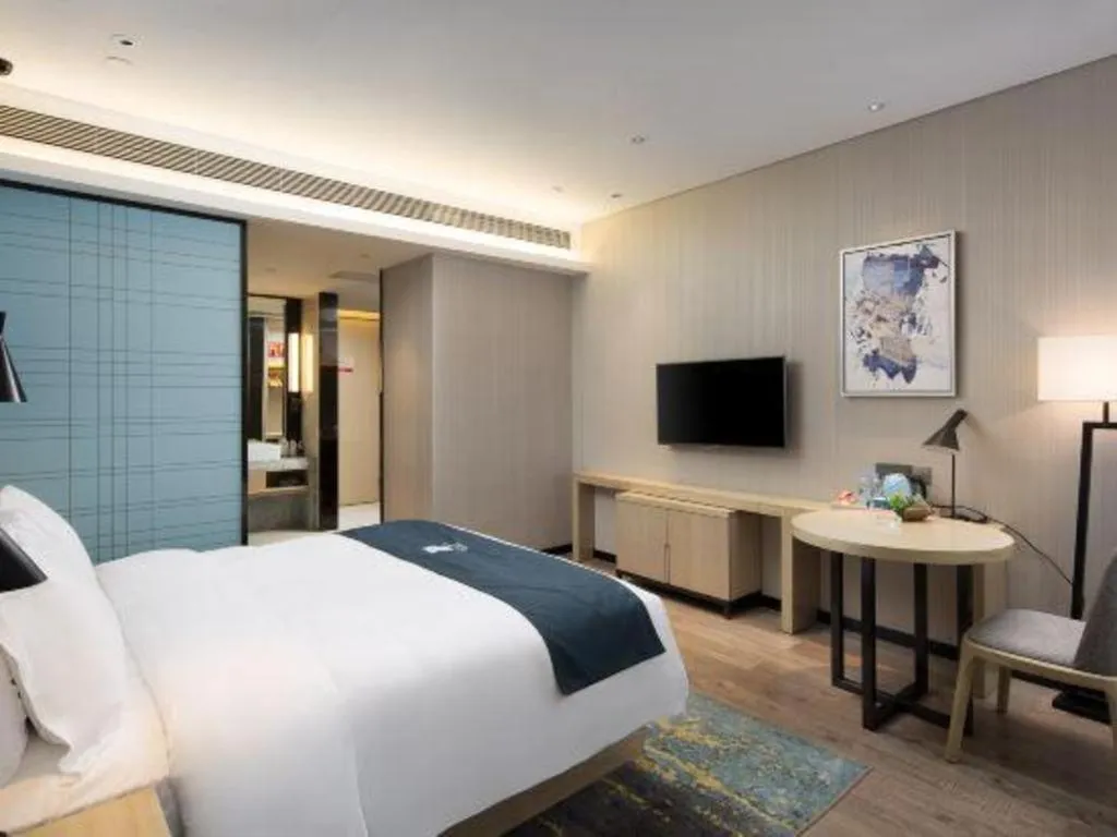 Bed in Echarm Hotel Changsha Gaoqiao