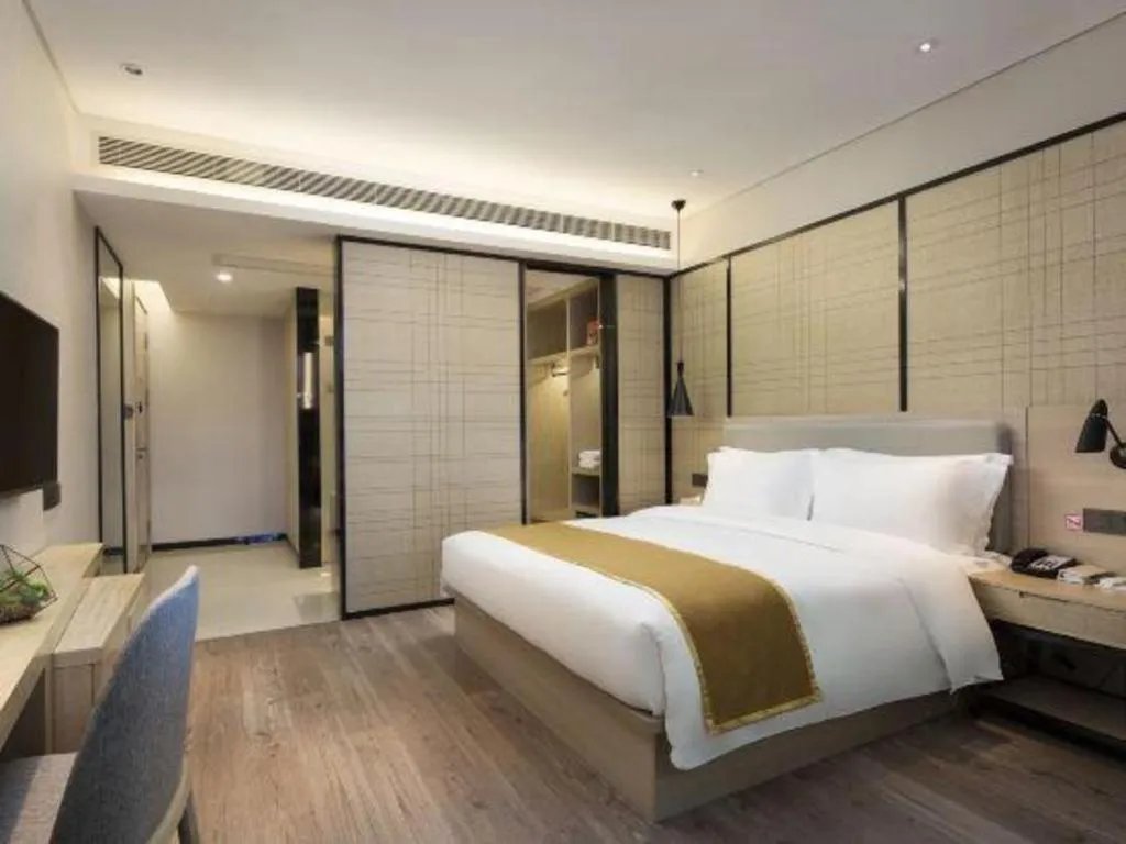 Bed in Echarm Hotel Changsha Gaoqiao