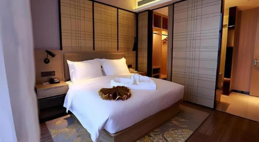 Bed in Echarm Hotel Changsha Gaoqiao