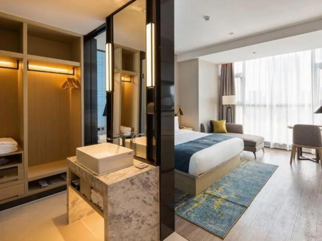 Bed in Echarm Hotel Changsha Gaoqiao