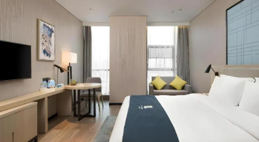 Bed in Echarm Hotel Changsha Gaoqiao