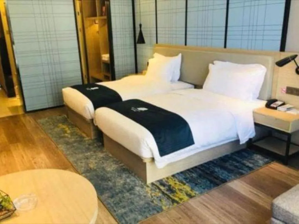Bed in Echarm Hotel Changsha Gaoqiao
