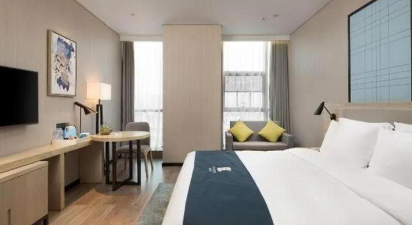 Bed in Echarm Hotel Changsha Gaoqiao