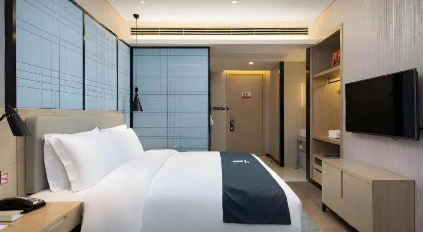 Bed in Echarm Hotel Changsha Gaoqiao