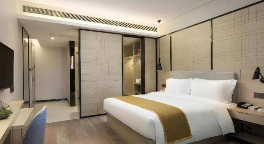 Bed in Echarm Hotel Changsha Gaoqiao