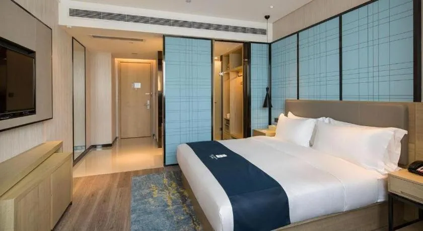 Bed in Echarm Hotel Changsha Gaoqiao