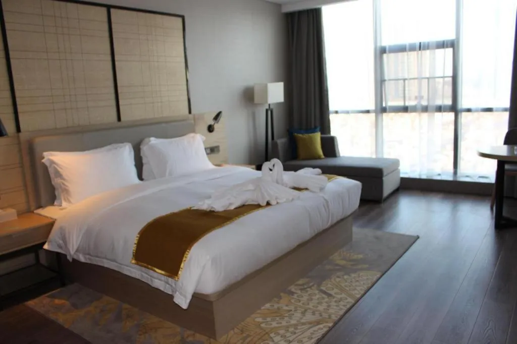 Bed in Echarm Hotel Changsha Gaoqiao
