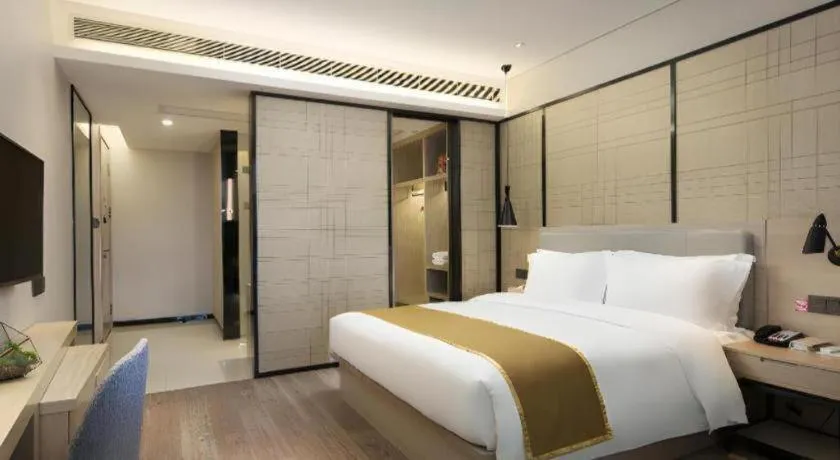 Bed in Echarm Hotel Changsha Gaoqiao
