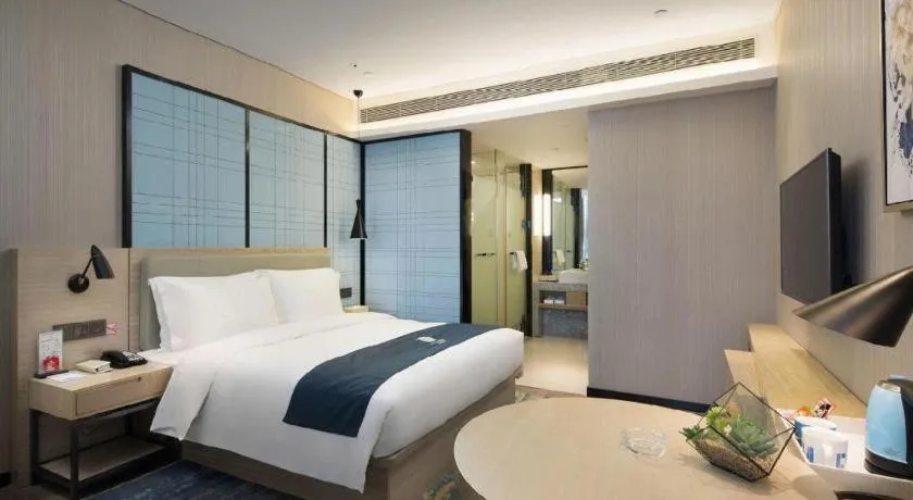 Bed in Echarm Hotel Changsha Gaoqiao