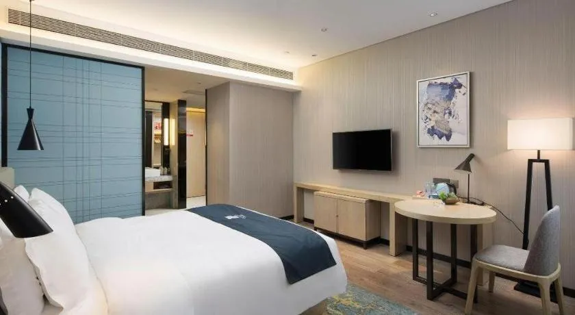 Bed in Echarm Hotel Changsha Gaoqiao