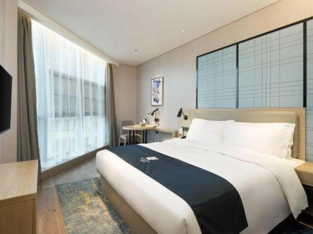 Bed in Echarm Hotel Changsha Gaoqiao