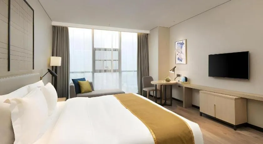 Bed in Echarm Hotel Changsha Gaoqiao