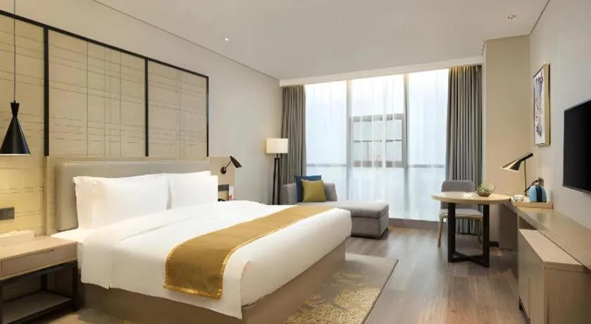 Bed in Echarm Hotel Changsha Gaoqiao
