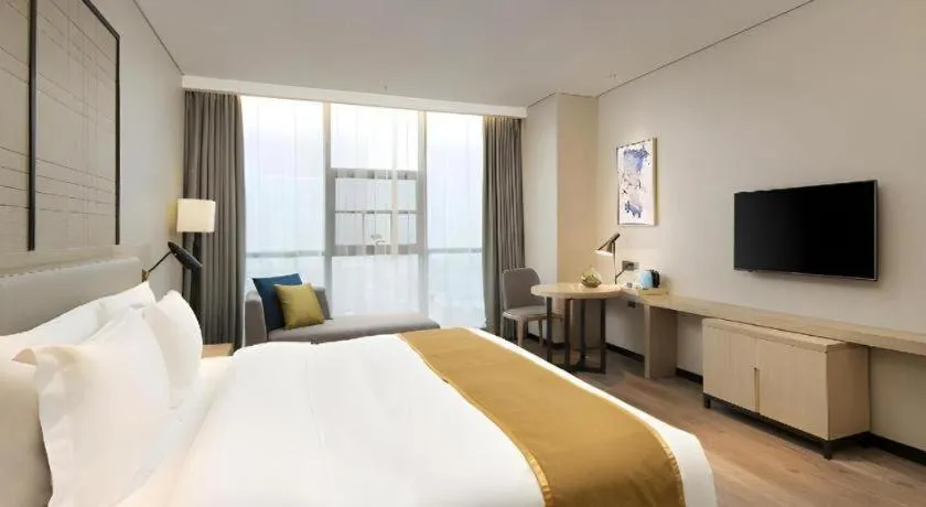 Bed in Echarm Hotel Changsha Gaoqiao