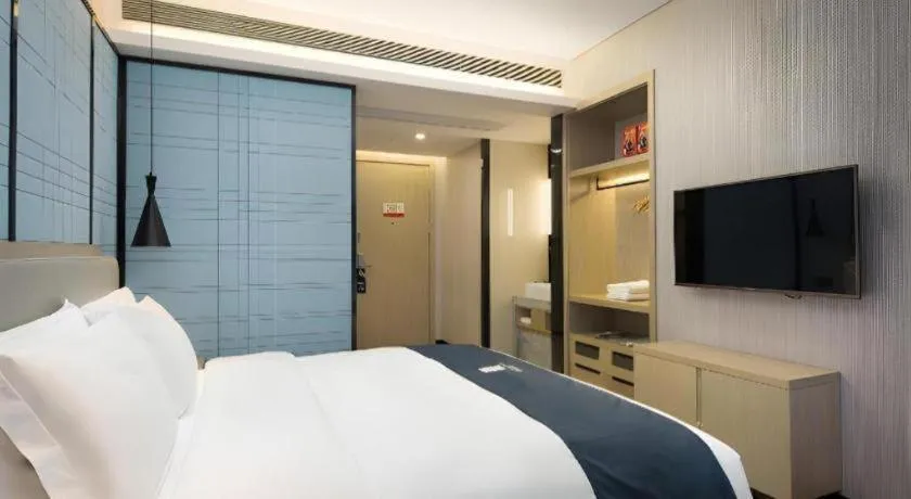 Bed in Echarm Hotel Changsha Gaoqiao