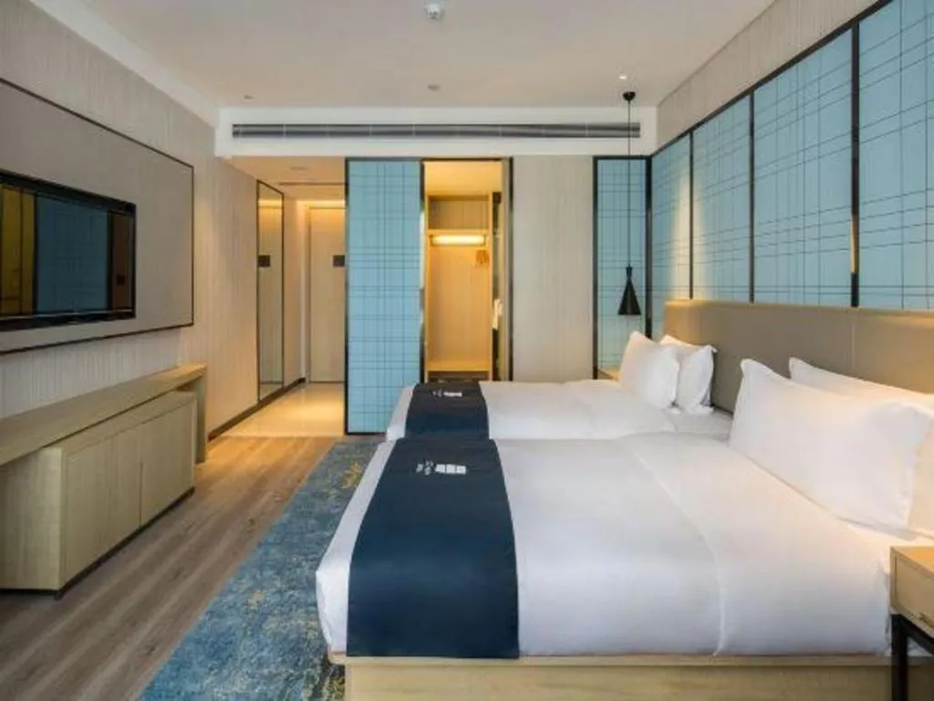 Bed in Echarm Hotel Changsha Gaoqiao