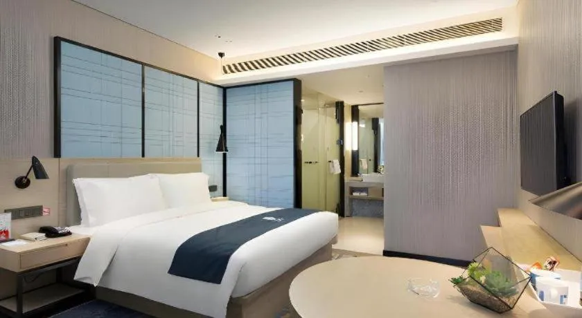 Bed in Echarm Hotel Changsha Gaoqiao