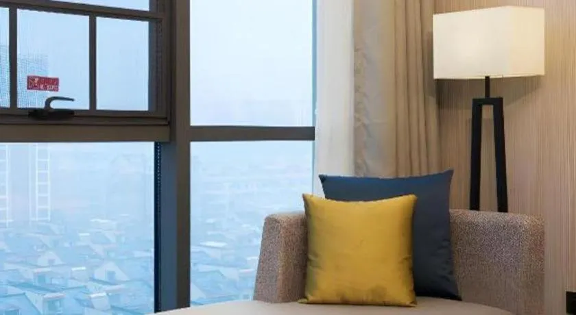 Bed in Echarm Hotel Changsha Gaoqiao