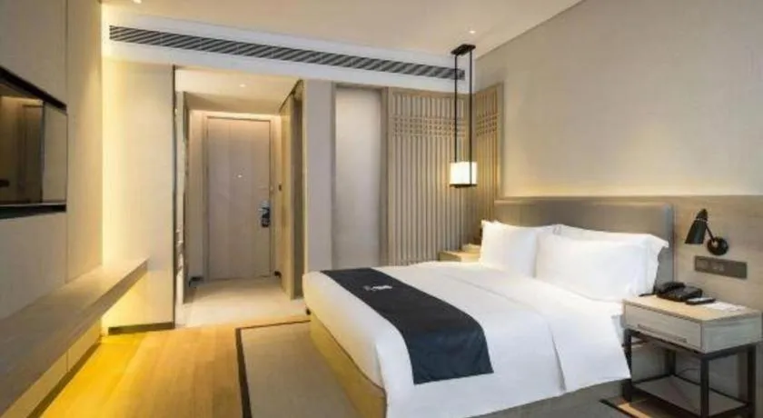Bed in Echarm Hotel Changsha Gaoqiao