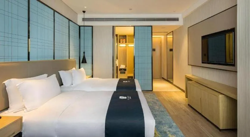 Bed in Echarm Hotel Changsha Gaoqiao