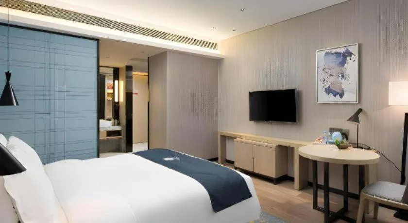 Bed in Echarm Hotel Changsha Gaoqiao