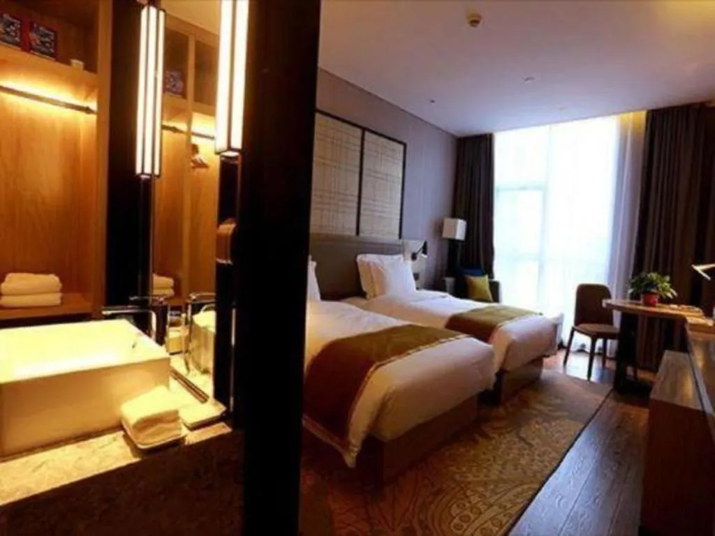 Bed in Echarm Hotel Changsha Gaoqiao