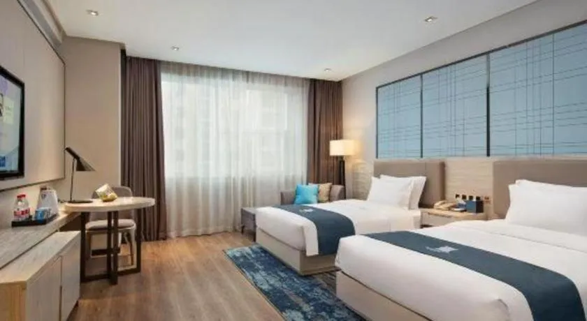 Bed in Echarm Hotel Changsha Gaoqiao