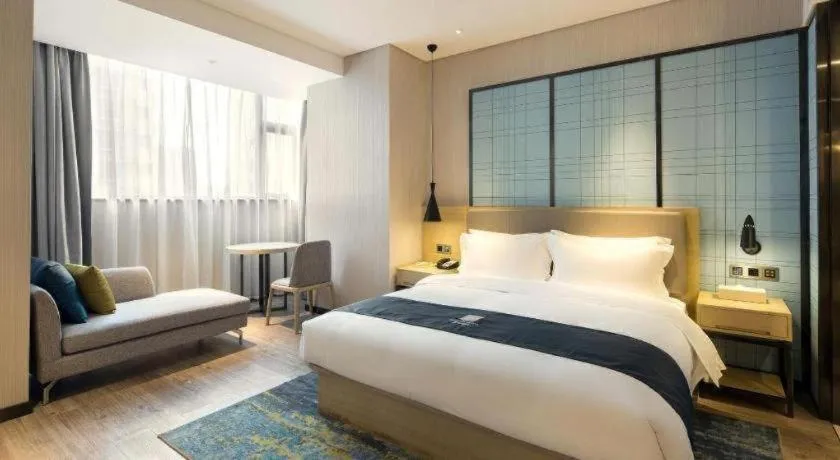 Bed in Echarm Hotel Changsha Gaoqiao