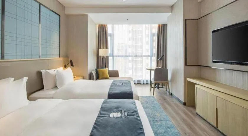 Bed in Echarm Hotel Changsha Gaoqiao