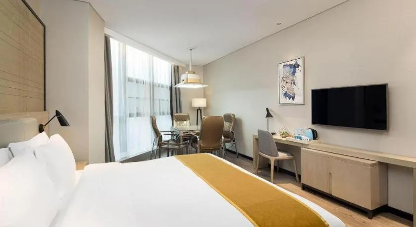 Bed in Echarm Hotel Changsha Gaoqiao