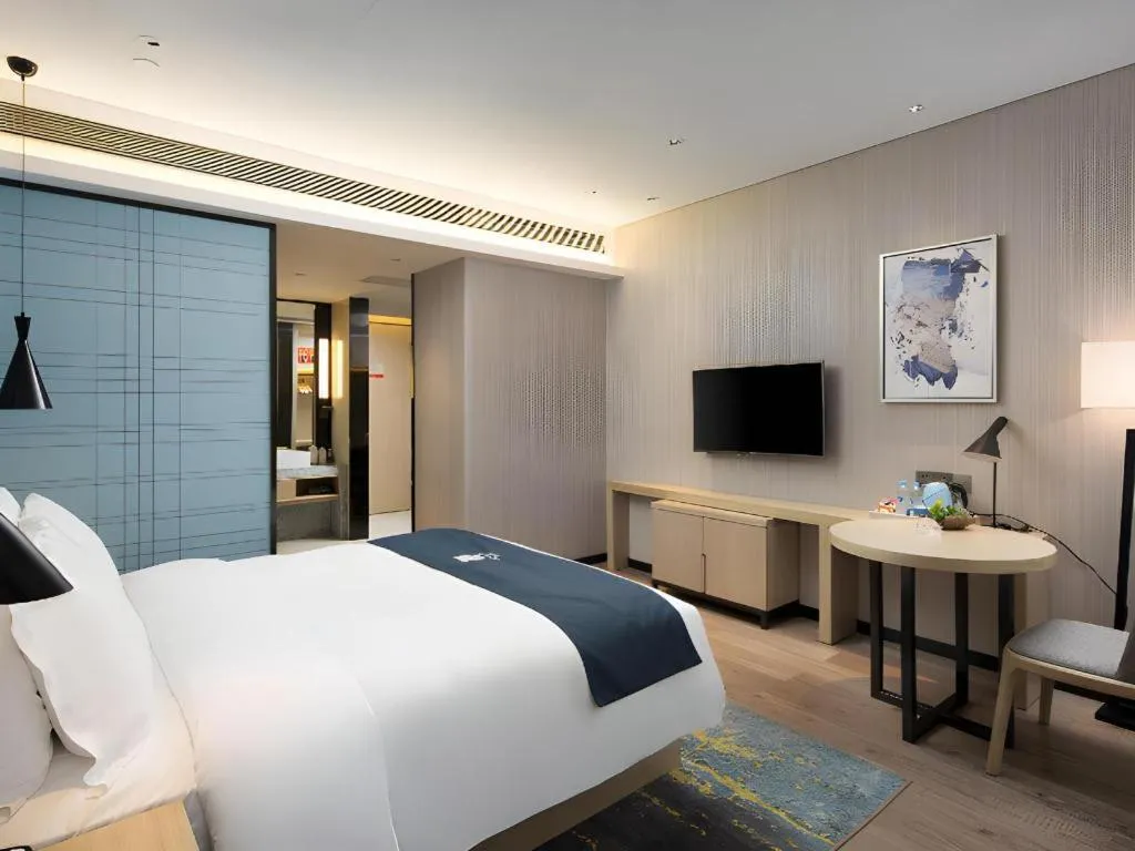 Bed in Echarm Hotel Changsha Gaoqiao