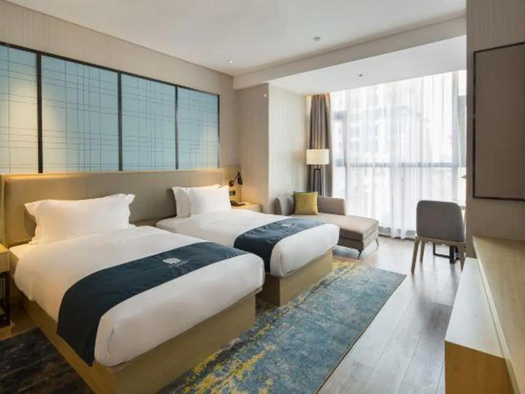 Bed in Echarm Hotel Changsha Gaoqiao