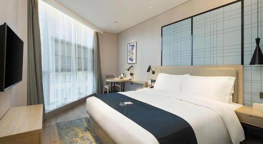 Bed in Echarm Hotel Changsha Gaoqiao