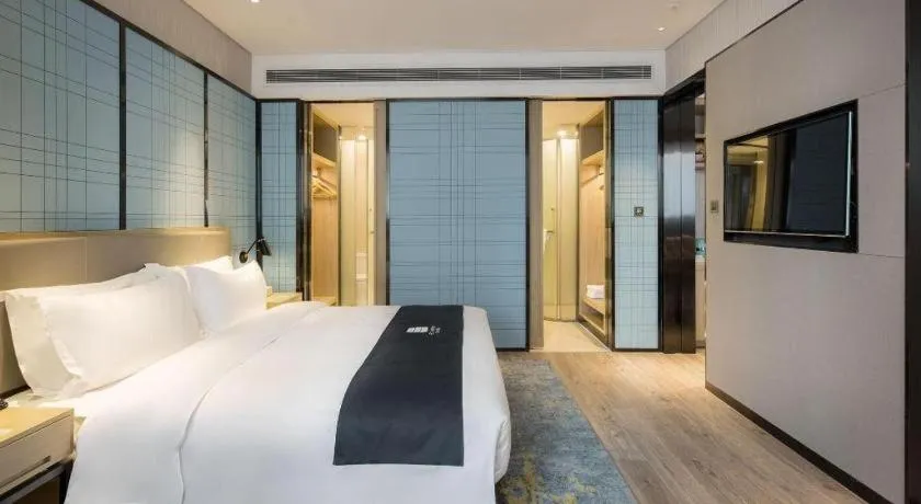 Bed in Echarm Hotel Changsha Gaoqiao