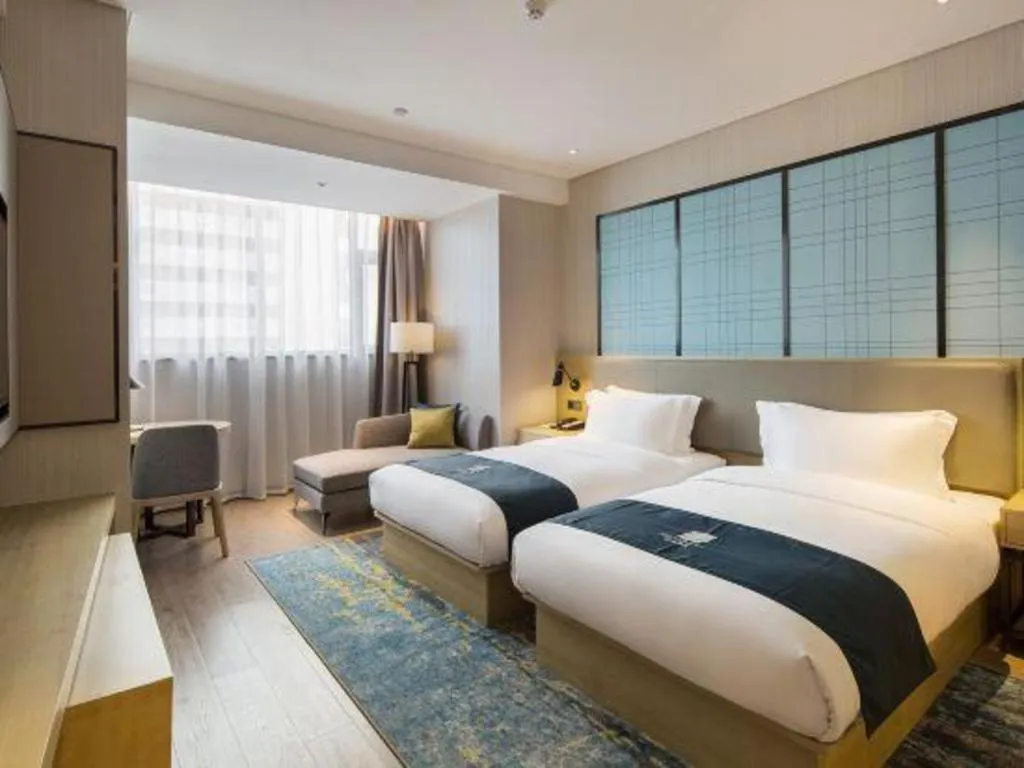 Bed in Echarm Hotel Changsha Gaoqiao