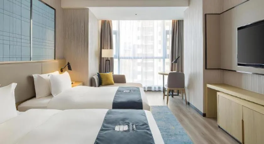 Bed in Echarm Hotel Changsha Gaoqiao