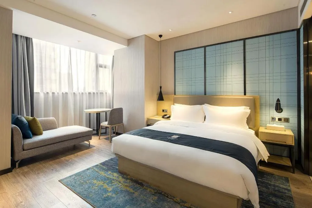 Bed in Echarm Hotel Changsha Gaoqiao