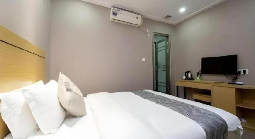 Bed in Ying Feng Yuan Hotel