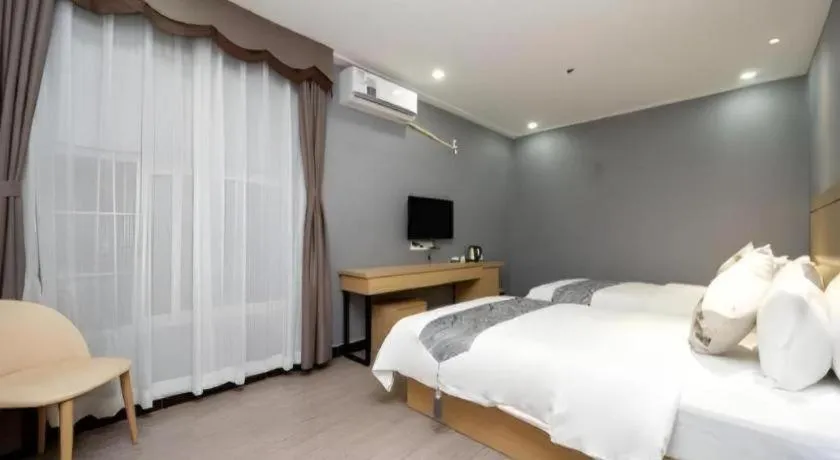 Bed in Ying Feng Yuan Hotel