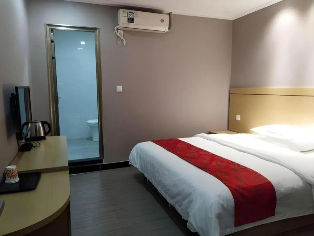 Bed in Ying Feng Yuan Hotel