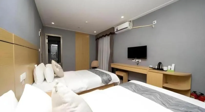 Bed in Ying Feng Yuan Hotel